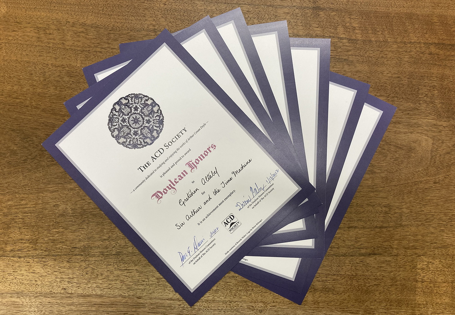 fanned array of Doylean Honors certificates